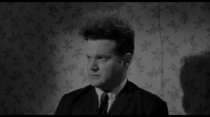 Henry (Jack Nance) at one of the most uncomfortable, awkward family dinners I've ever seen on film.